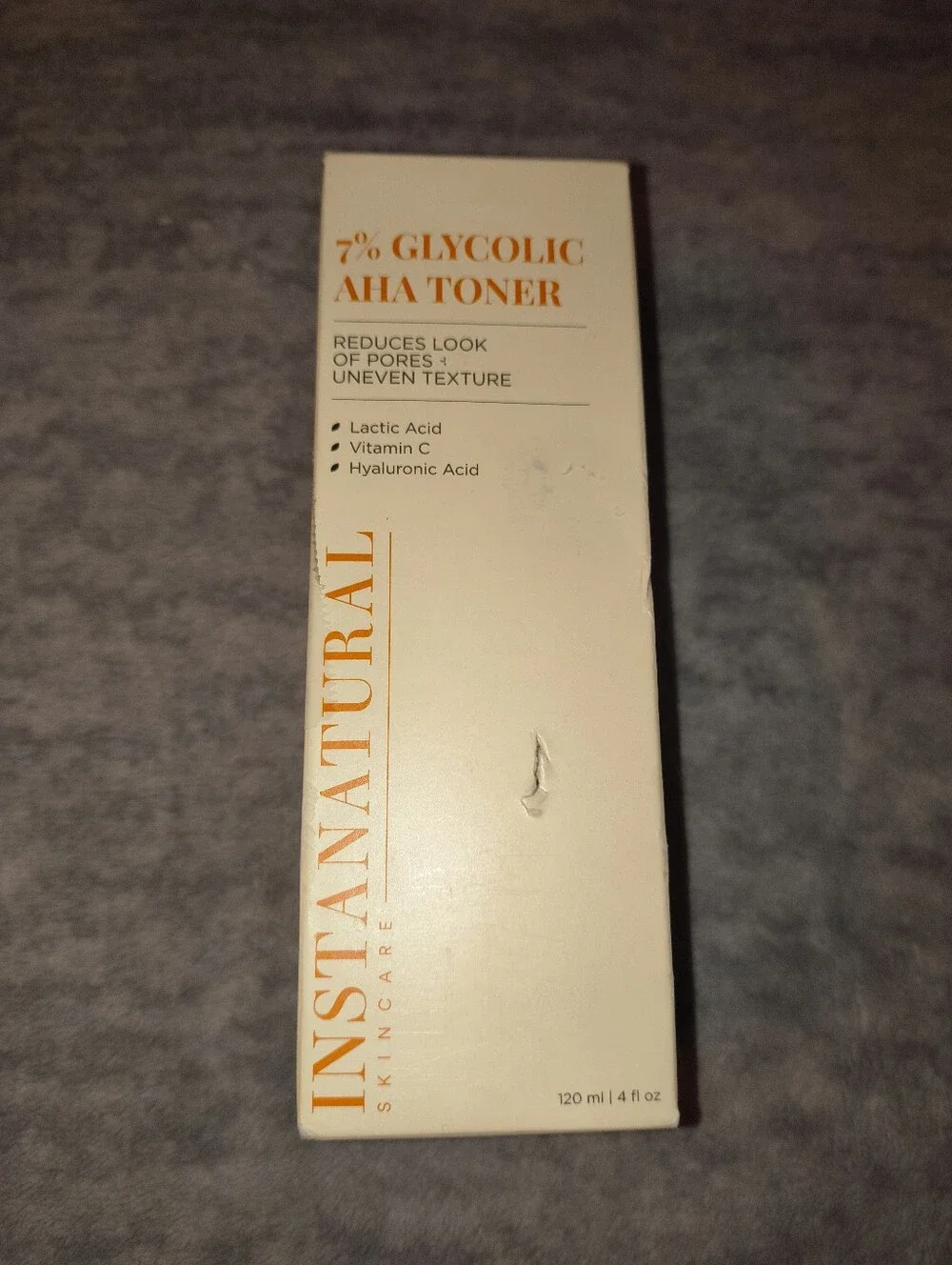 Instanatural 7% Glycolic AHA Toner - Cream/Orange Text